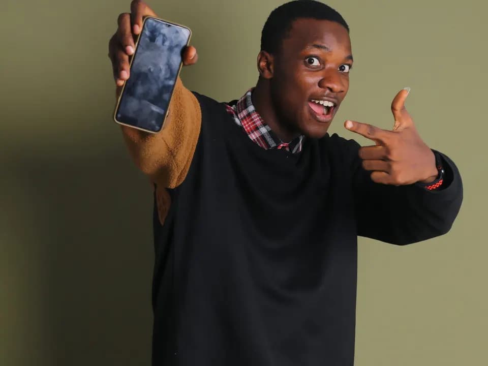 A buyer confirms a Mobile Money payment on his phone